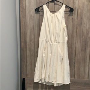 Cream dress with red zipper back detail